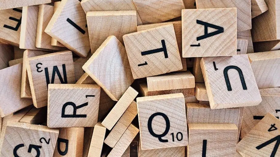 pile of scrabble letter tiles